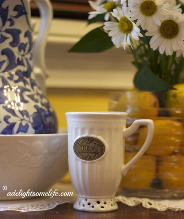 Teacup and flower arrangement