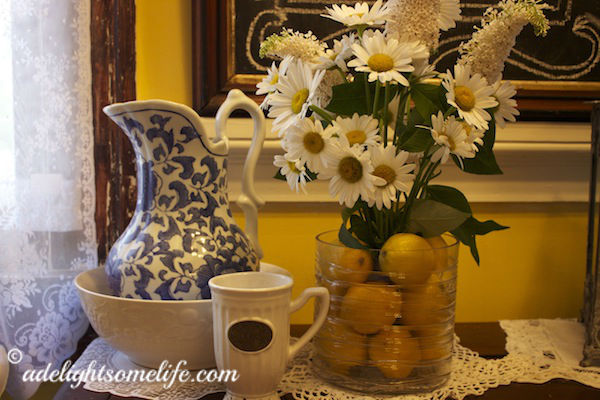 flower arrangement teacup and pitcher