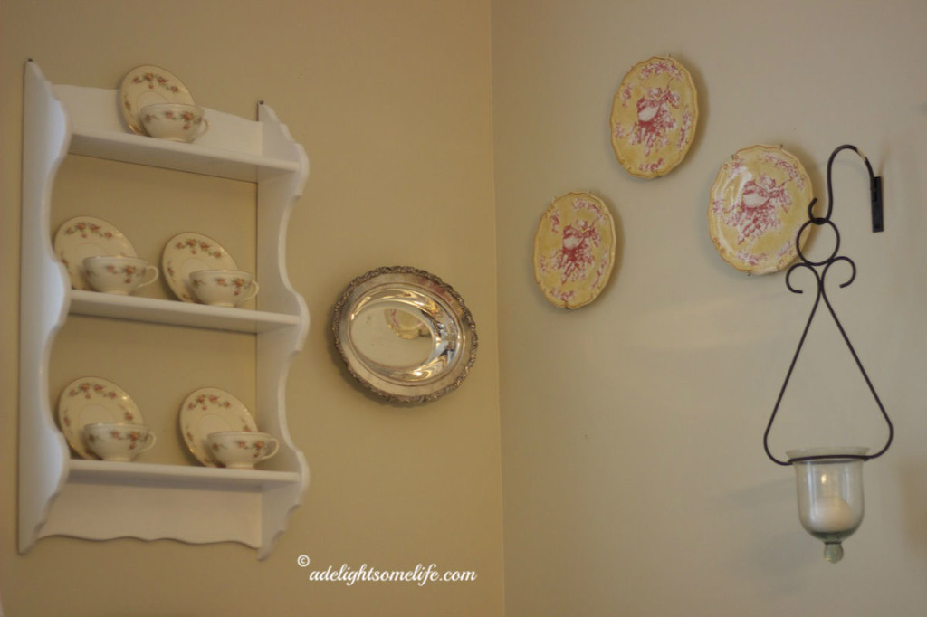 A Delightsome Life corner with plates and cups