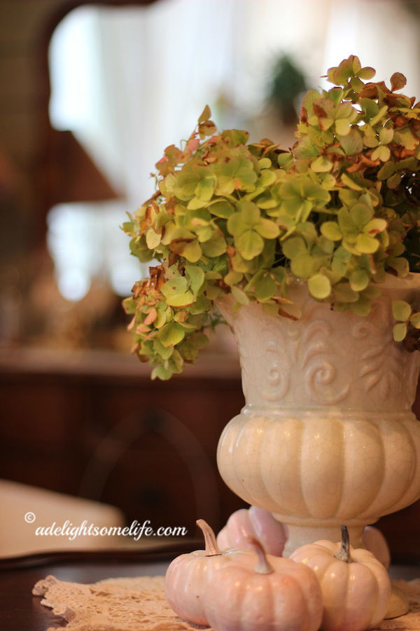 dried hydrangea urn pumpkin autumn vignette