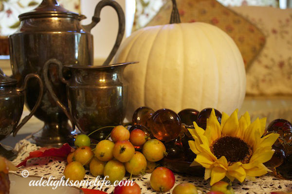 Autumnal vignette silver teapot white pumpkin crabapples glass grapes sunfloweradelightsomelife.com