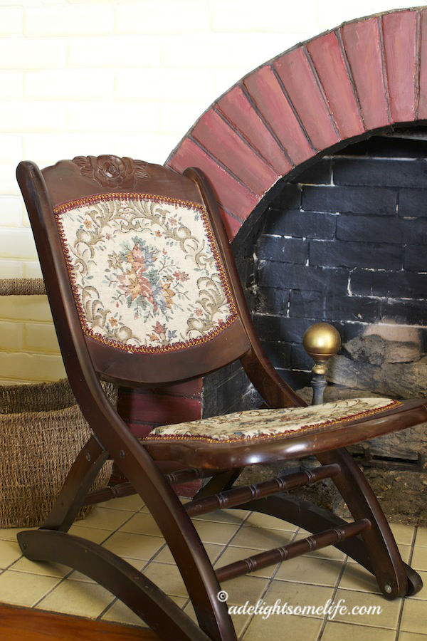goodwill chair living room fireplace vignette