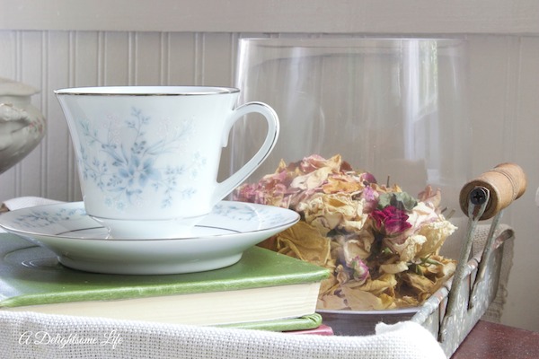 A-DELIGHTSOME-LIFE-BLUE-AND-WHITE-TEACUP-DRIED-ROSES-MORNING-MUSING