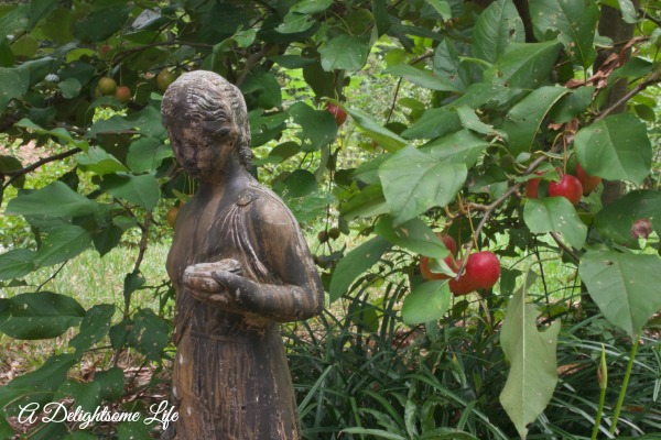 Autumn Crabapples with Statue A Delightsome Life