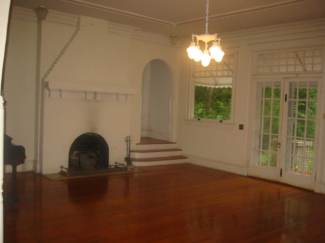 The living room 10 years ago when we moved in - nearly everything was painted white - including the chandelier