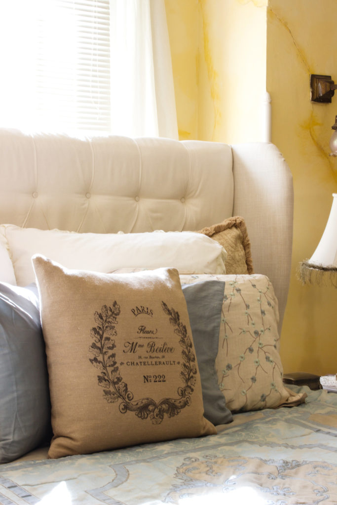 The Master bedroom is our retreat. It is now decorated in soothing colors for winter to include LOTS of pillows