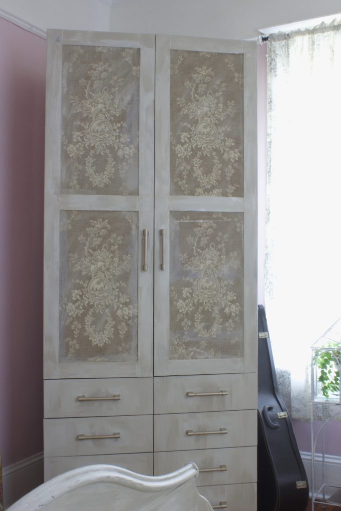 IKEA wardrobe transformation using paint, fabric and mod podge. One Room Challenge