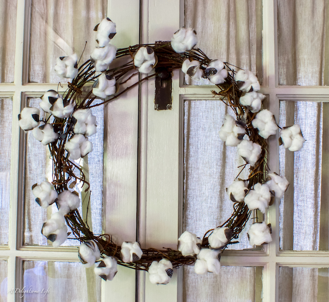 faux cotton boll wreath with cotton boll stems attached tutorial on A Delightsome Life
