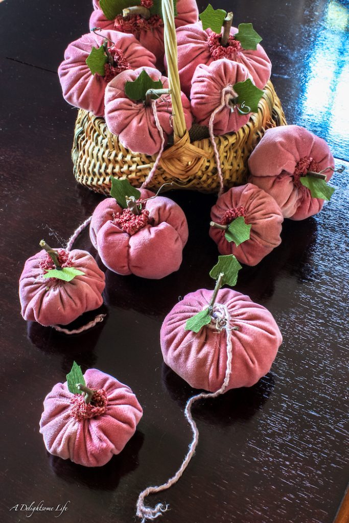 making DIY pumpkins for fall decor from upcycled fabric at A Delightsome Life