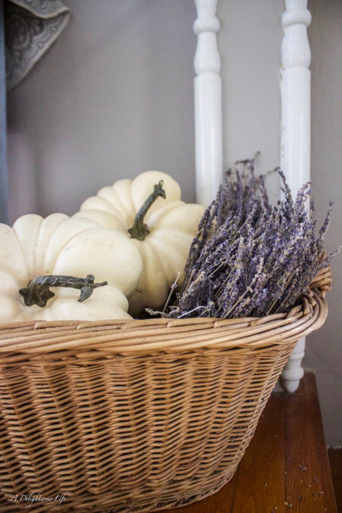 Seasonal white pumpkins with dried Lavender in a French basket on A Delightsome Life