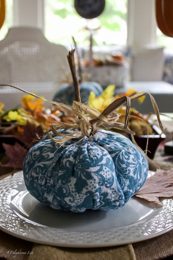 DIY blue and white pumpkin adds charm to the autumn tablescape on A Delightsome Life