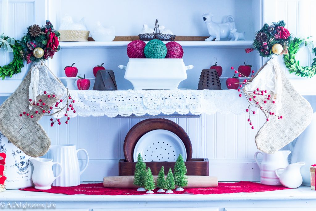 the kitchen hutch decorated in French Farmhouse style for Christmas on A Delightsome Life