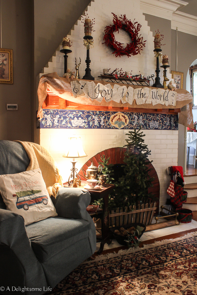 cozy spot by the fireplace for Christmas decor