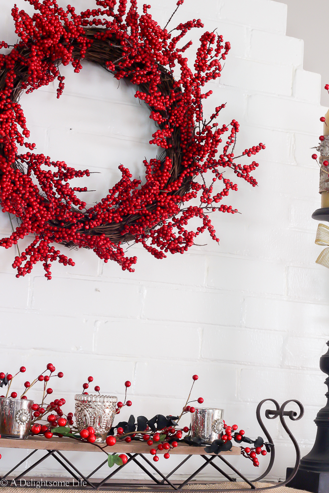 I redid this faux berry Christmas wreath to fit this year's decor