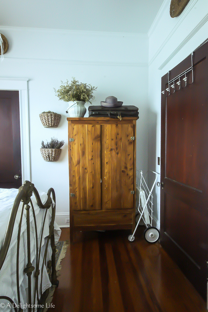 cedar wardobe in Prairie Style guest bedroom on A Delightsome Life