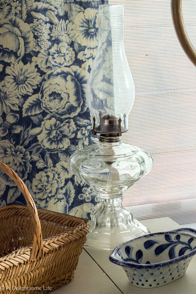 Prairie Style guest bedroom oil lamp on A Delightsome Life
