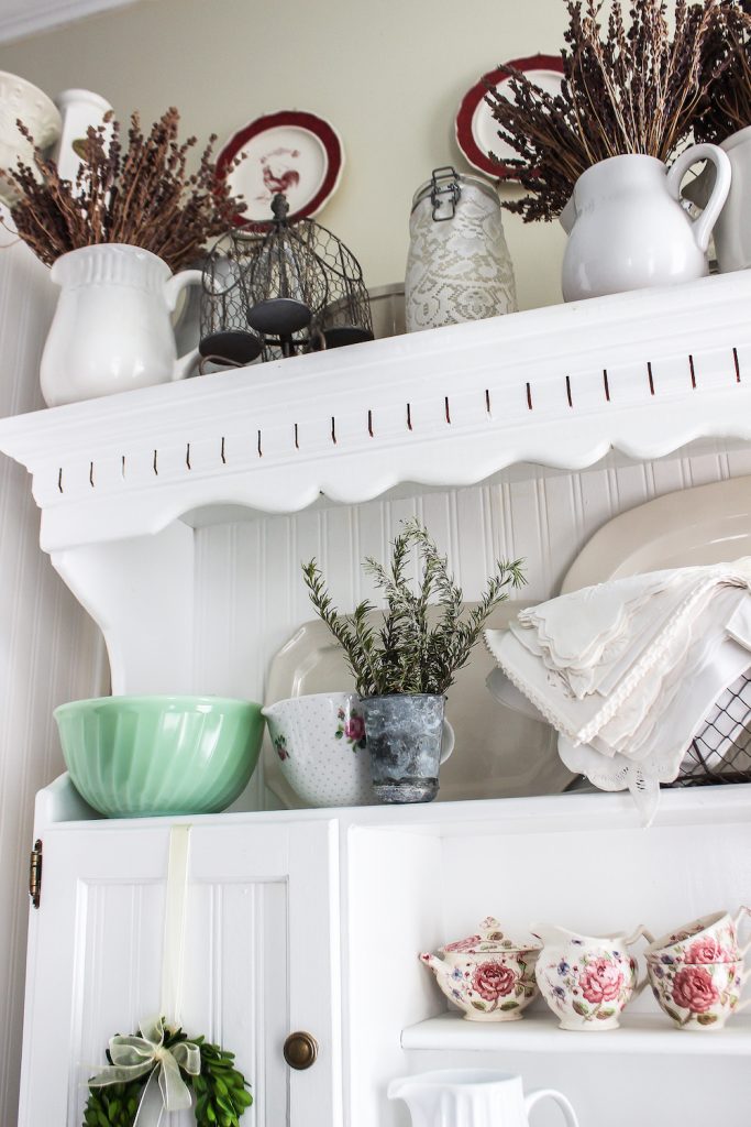 Shabby chic collectibles on kitchen hutch on A Delightsome Life