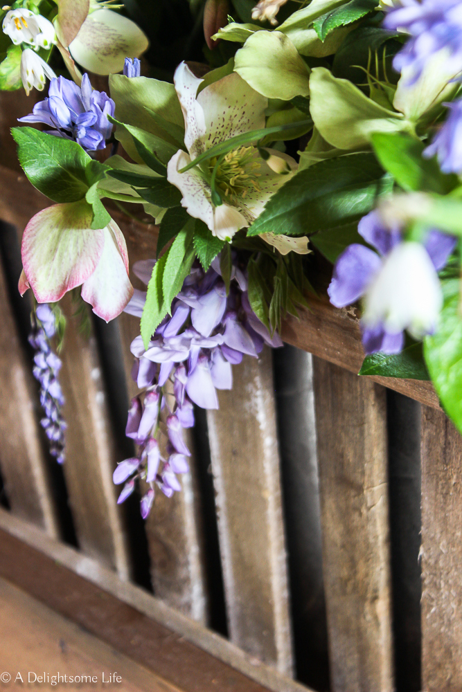 Hellebore and Wisteria in a Rustic Floral Arrangement