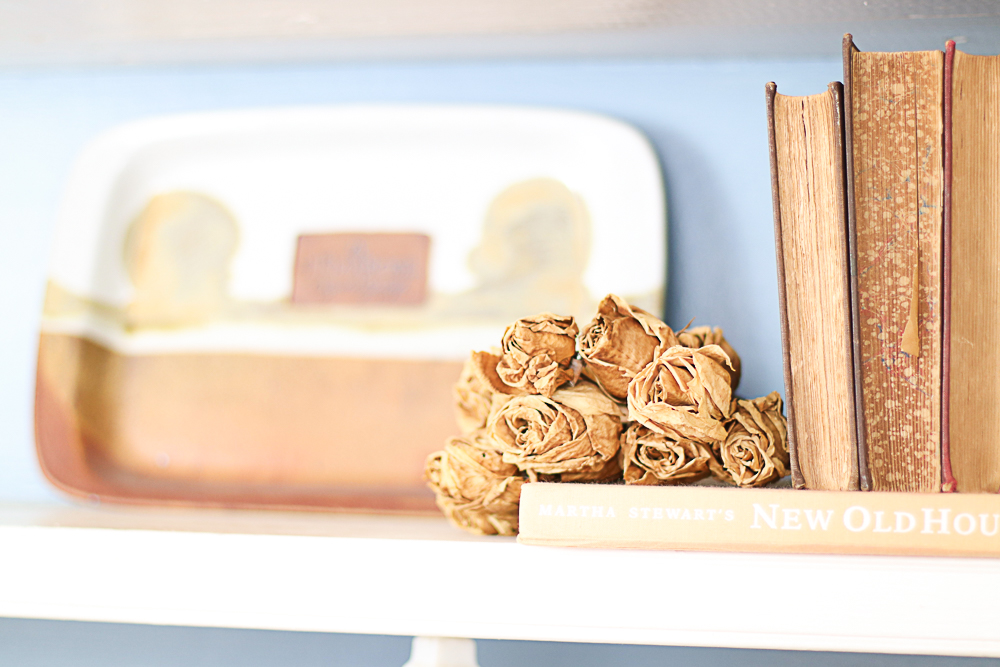 dried roses on shelf