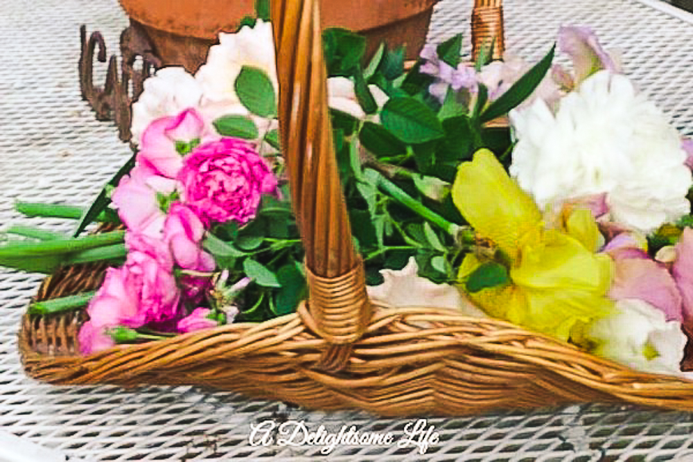 spring garden flowers in gathering basket